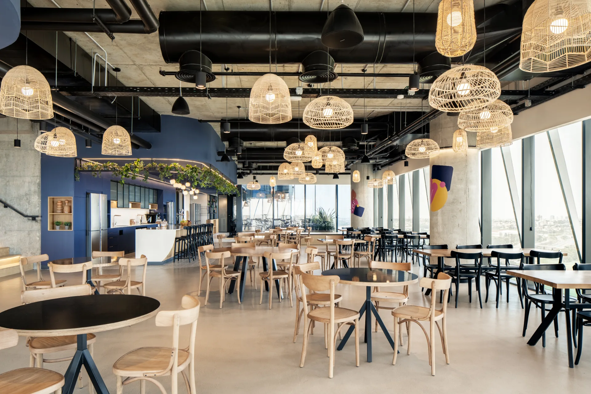 Cafeteria with woven pendant lights and views