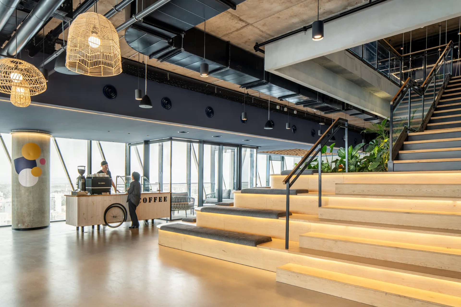 Internal stair beside the illuminated tiered seating