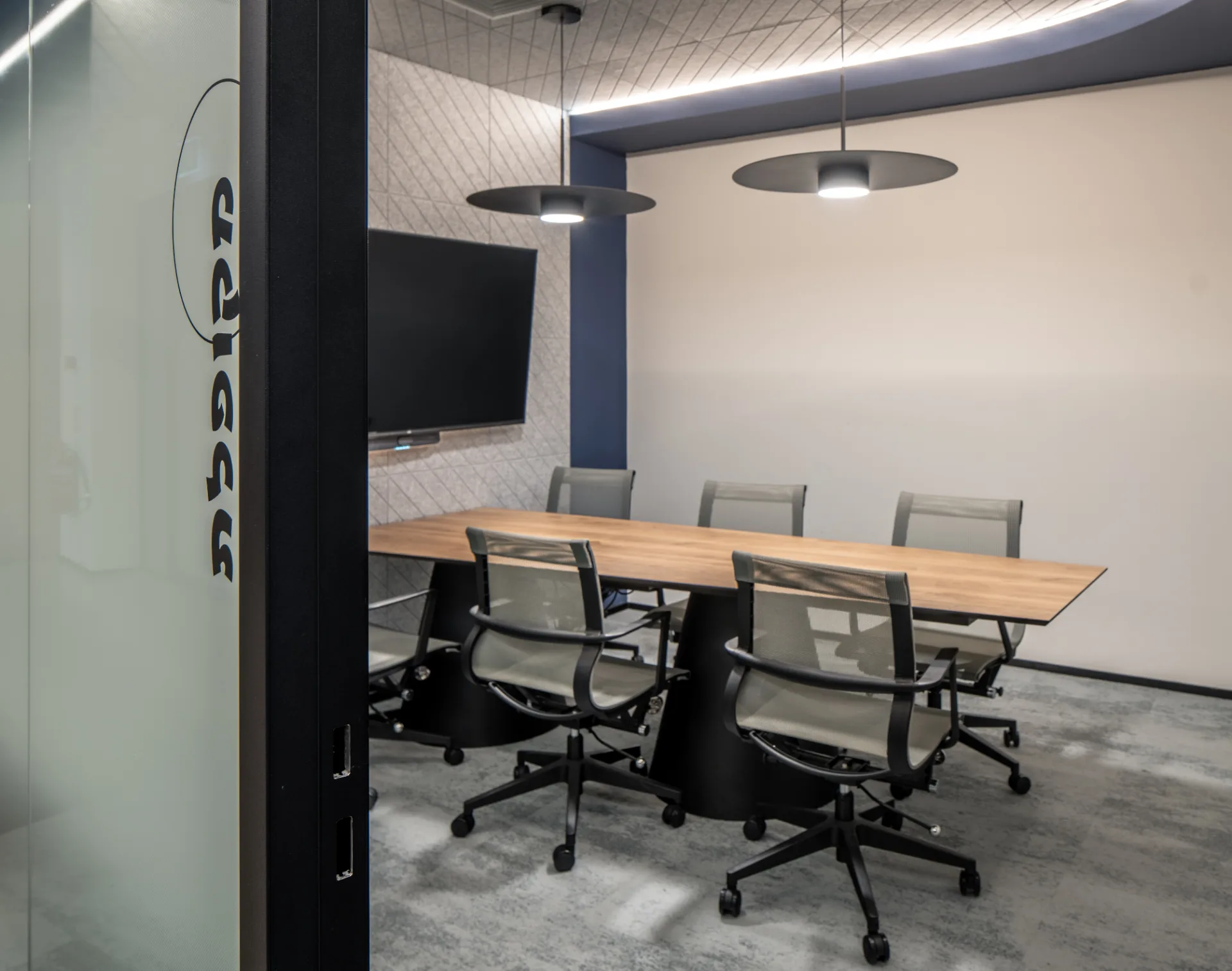 Meeting room with pendant fixtures