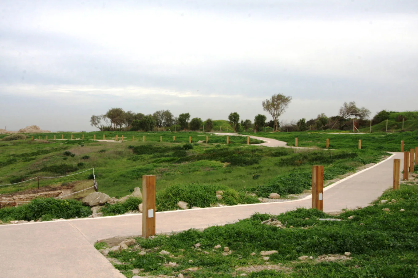 Winding park paths and timber bollards among the archaeological remains
