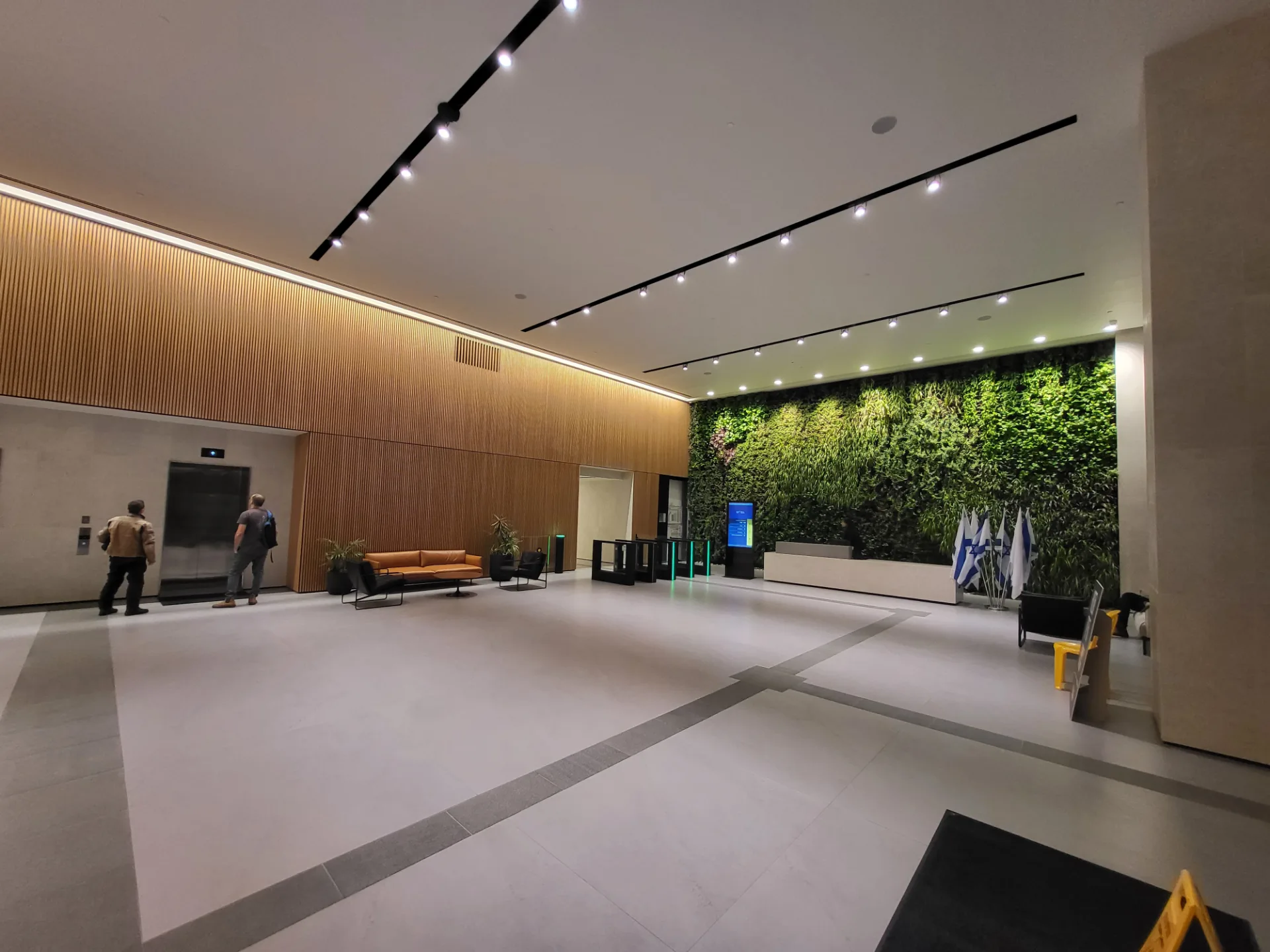 The reception lobby with a living green wall