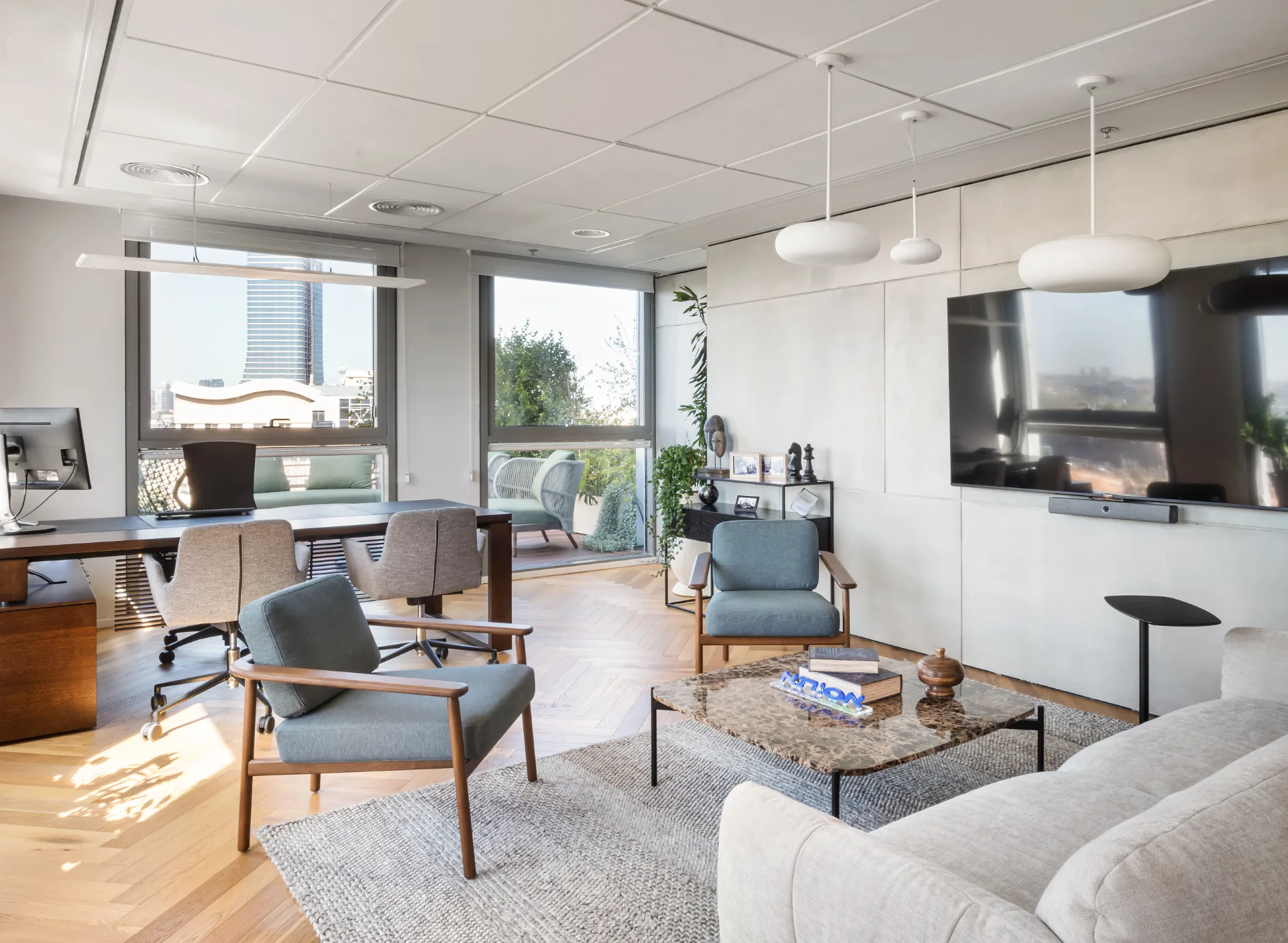 Executive office with a lounge corner and terrace