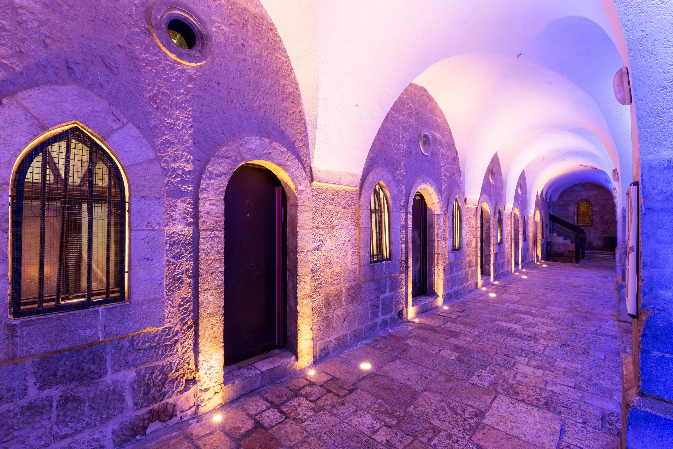 Illuminated arched passage