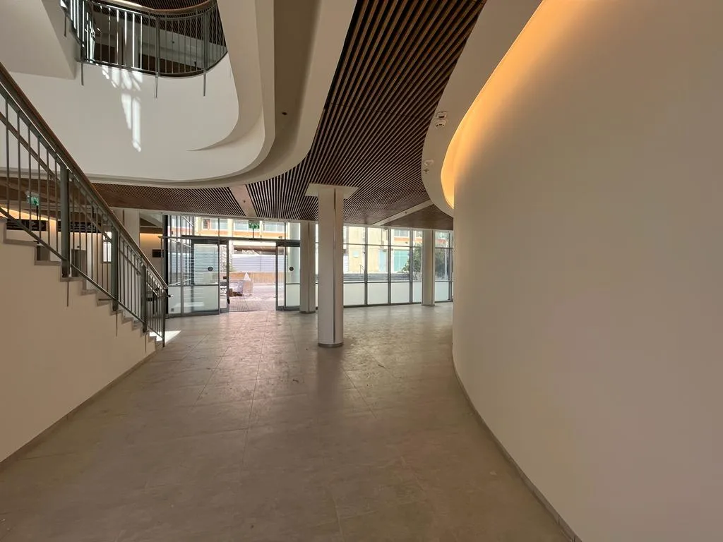 Curving corridor with bamboo cladding