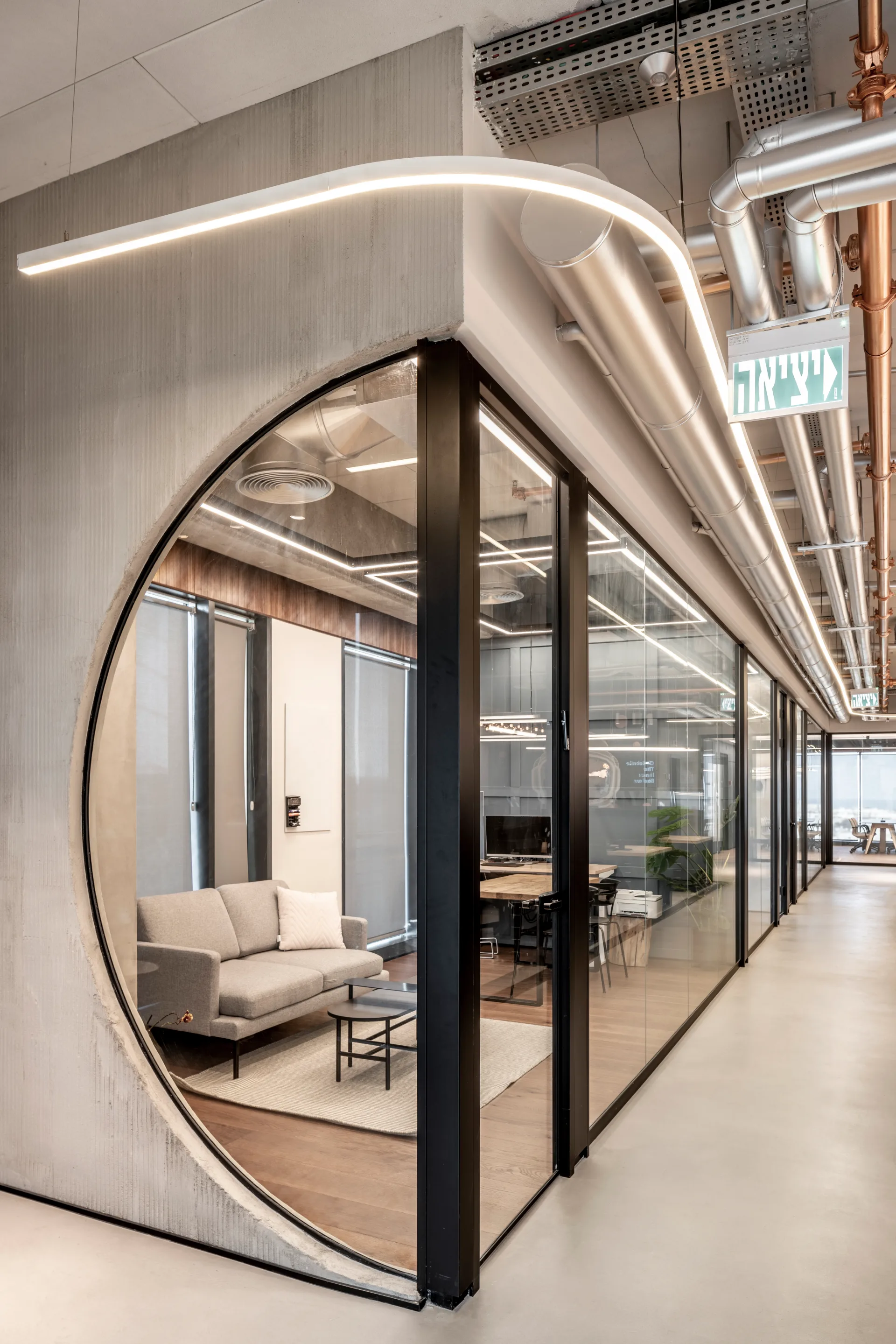 View through a round window into the workspace