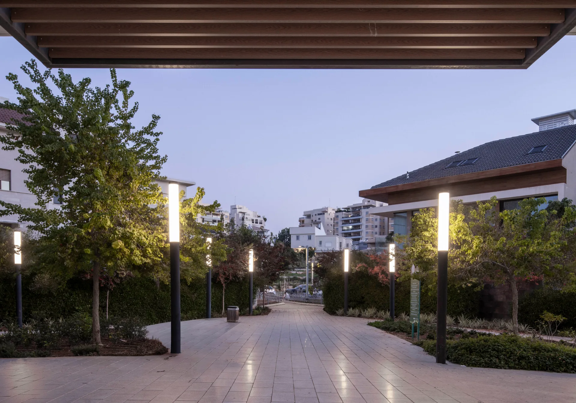 Illuminated pedestrian promenade with pole lighting