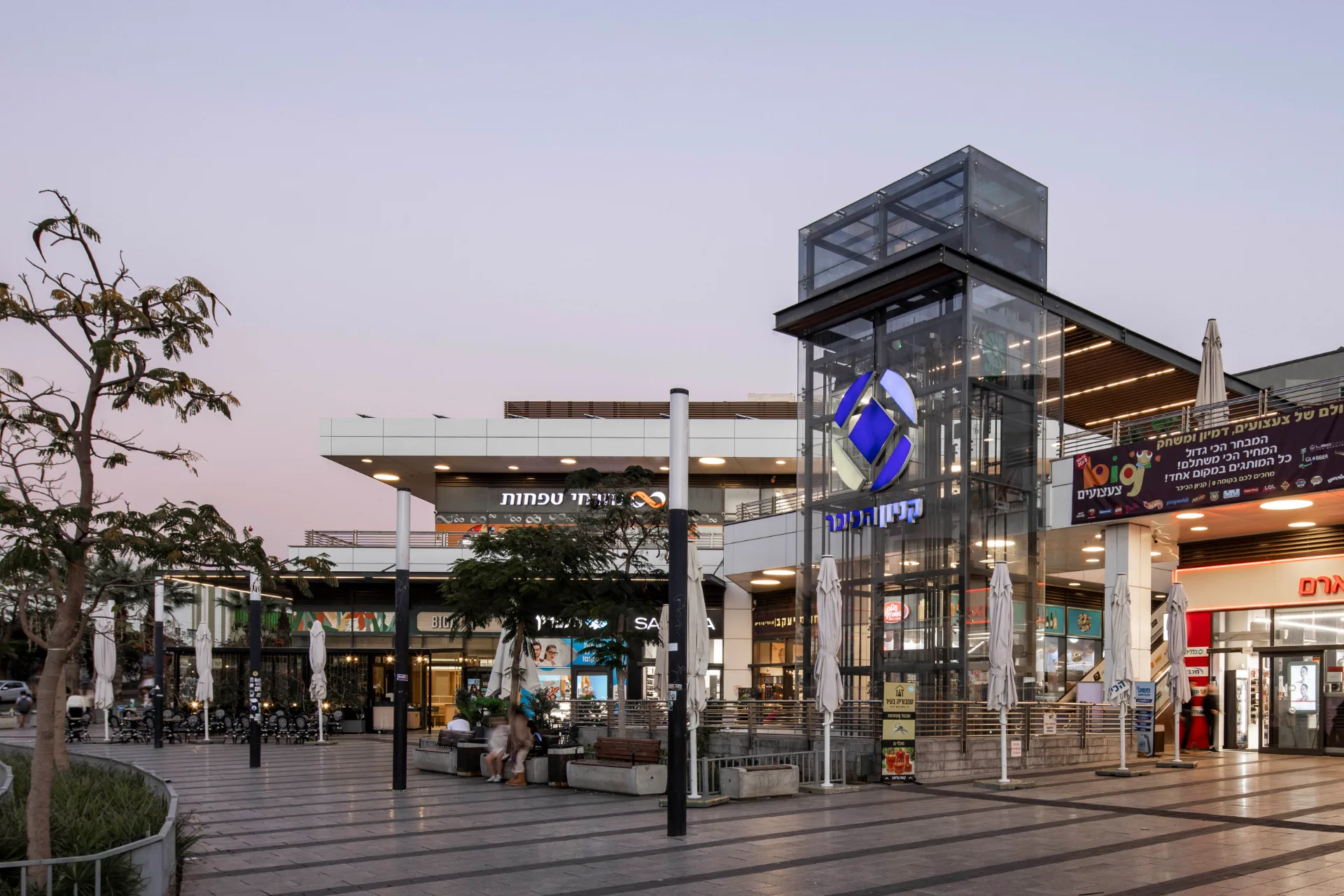 Entrance plaza with a glazed atrium tower