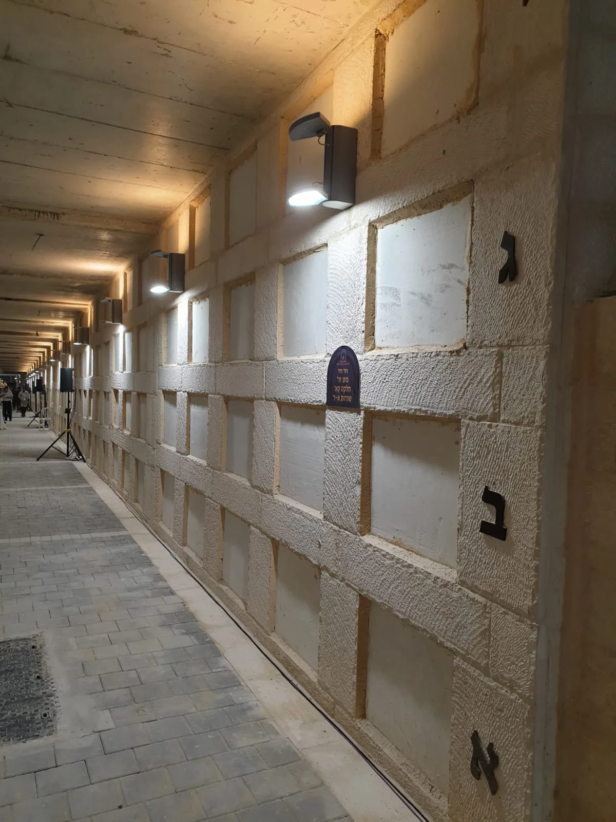 Lighting along an underground cemetery passage