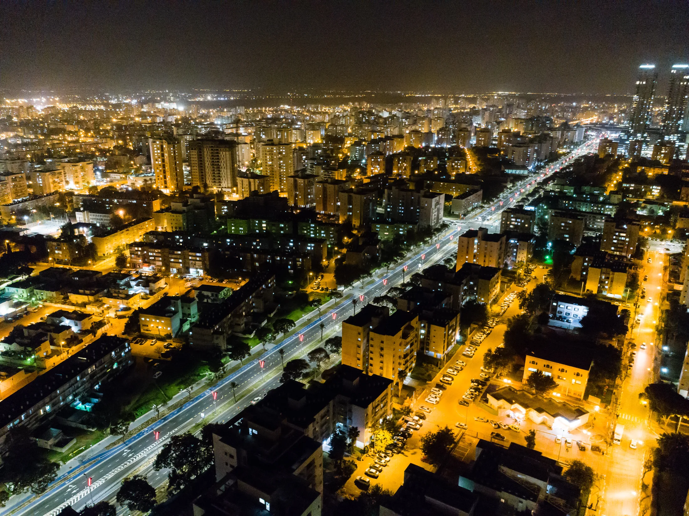 A night aerial view of Herzl Boulevard cutting across Ashdod