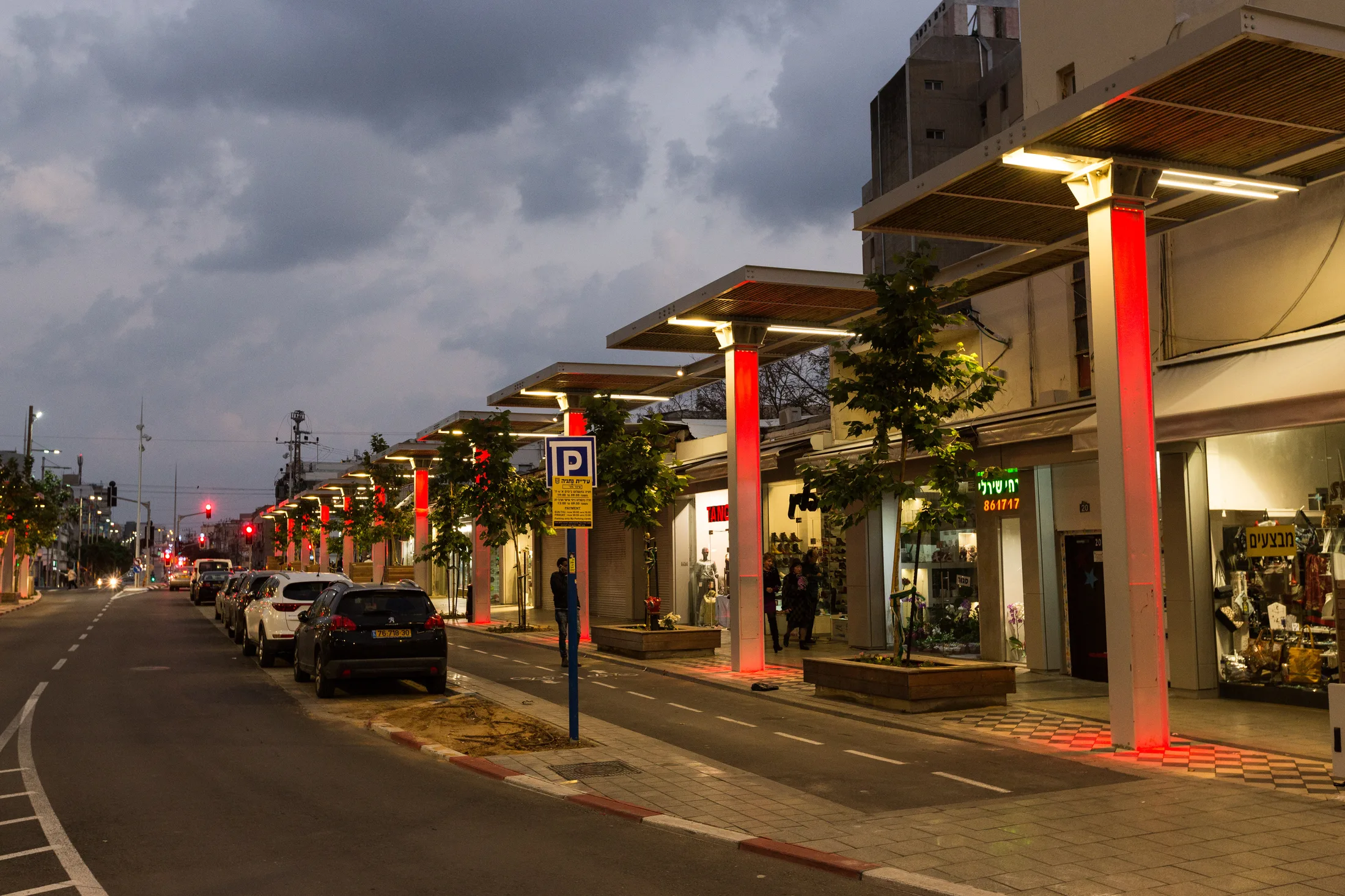 The historic colonnade facades with colorful accent lighting at night