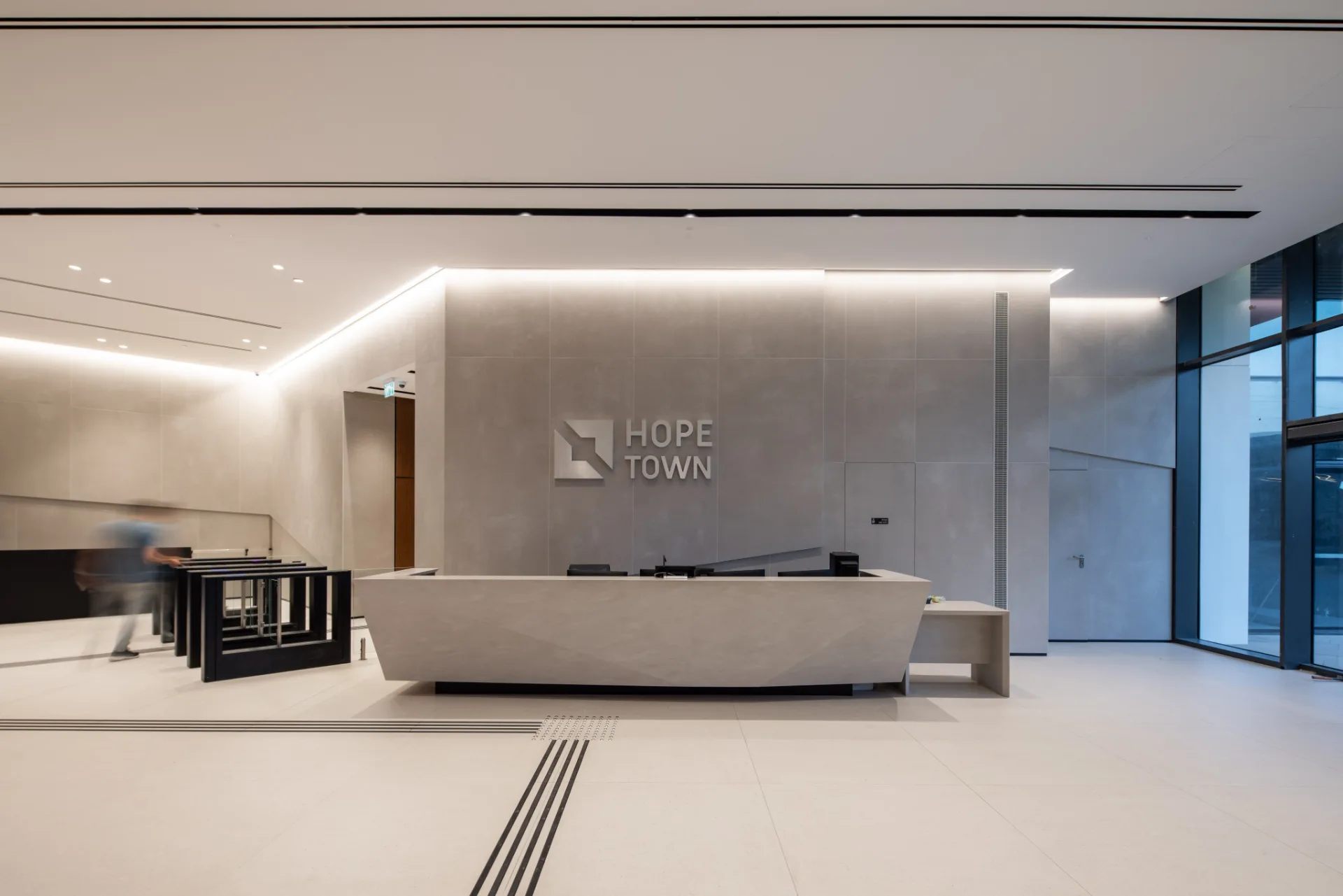 Reception lobby with the Hope Town sign and cove lighting
