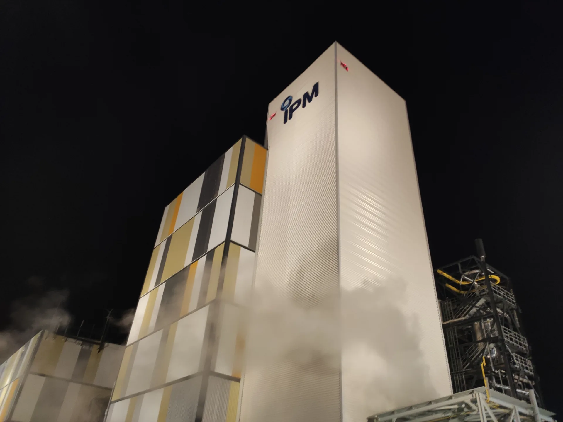 Illuminated IPM tower at night
