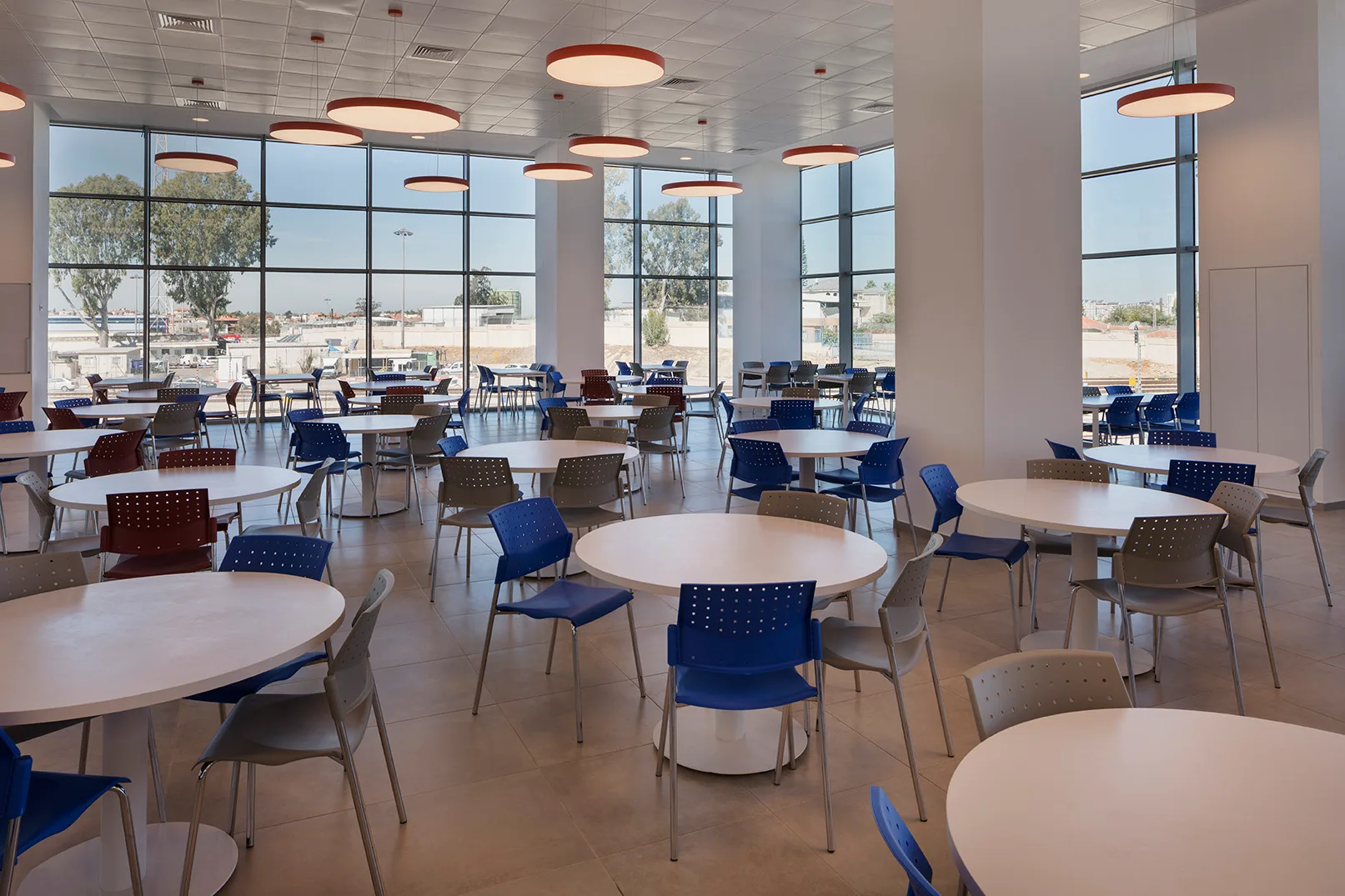 Staff cafeteria with circular pendant lighting