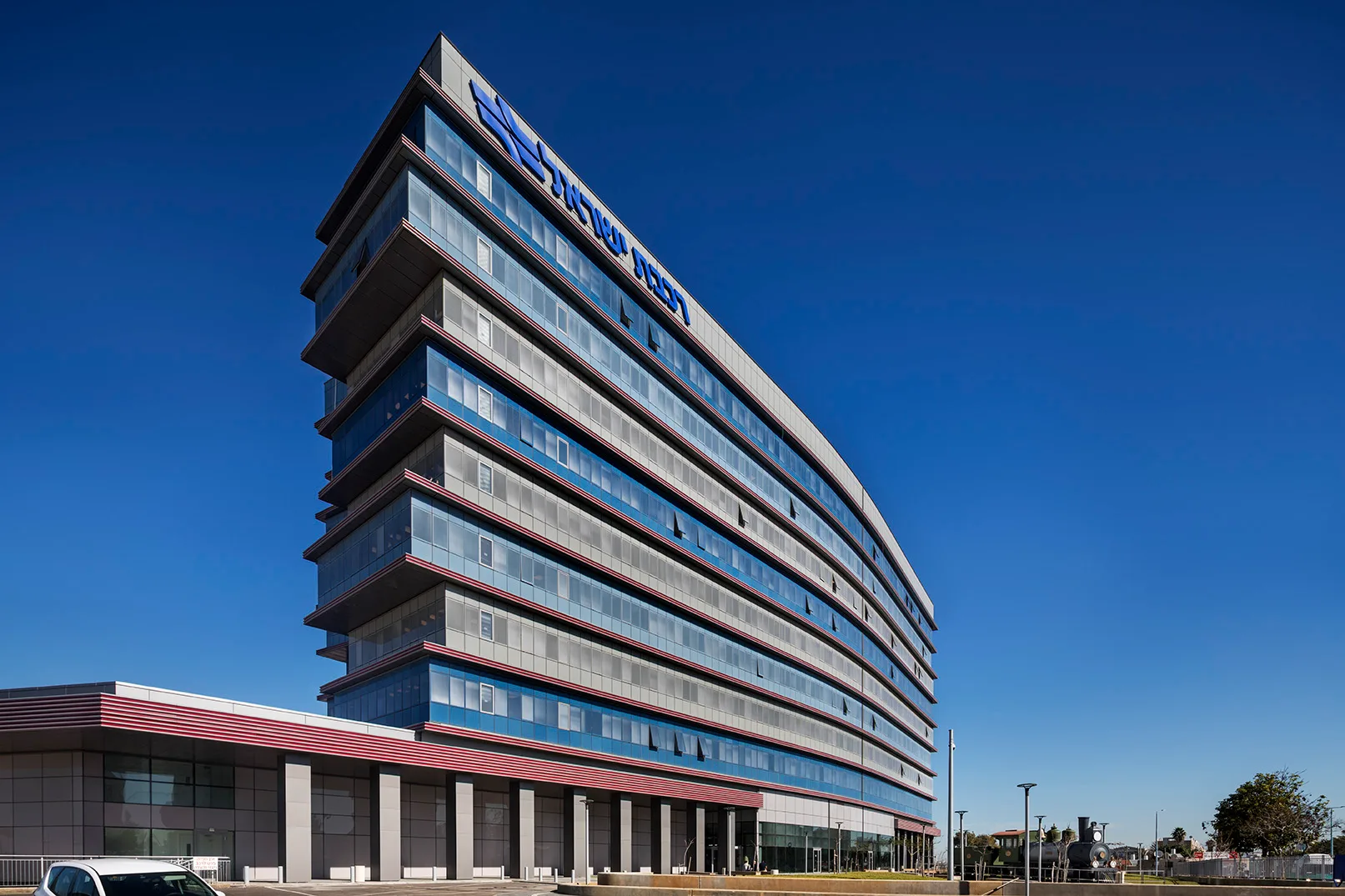 Curved glass facade of the Israel Railways building