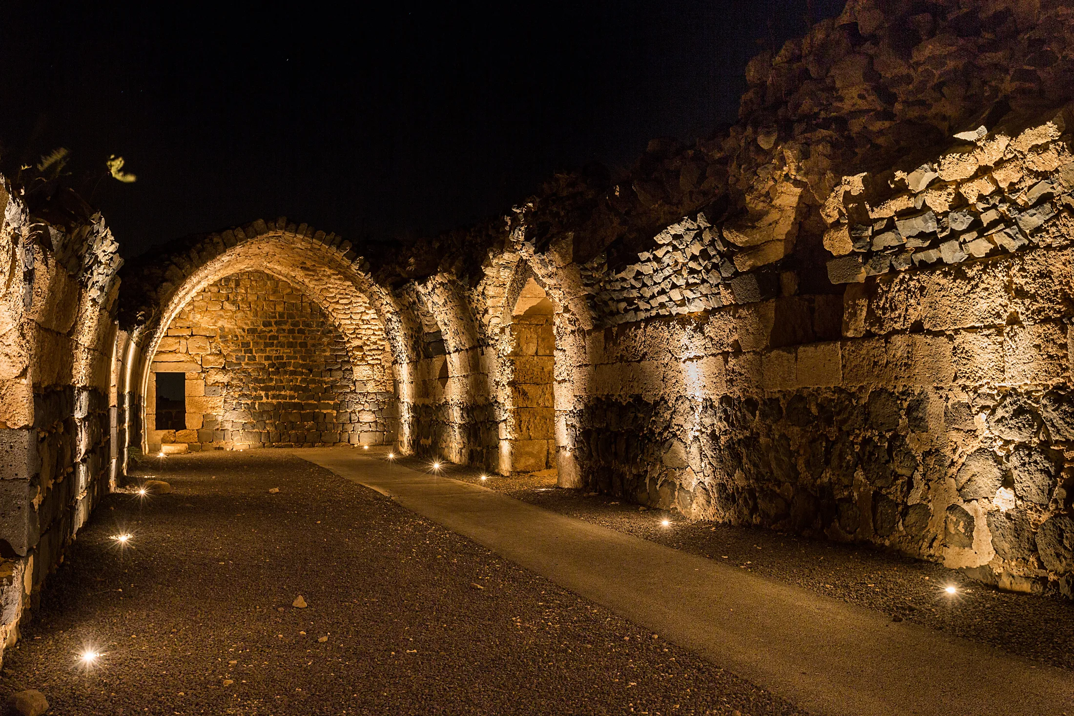 Sequence of arches at night