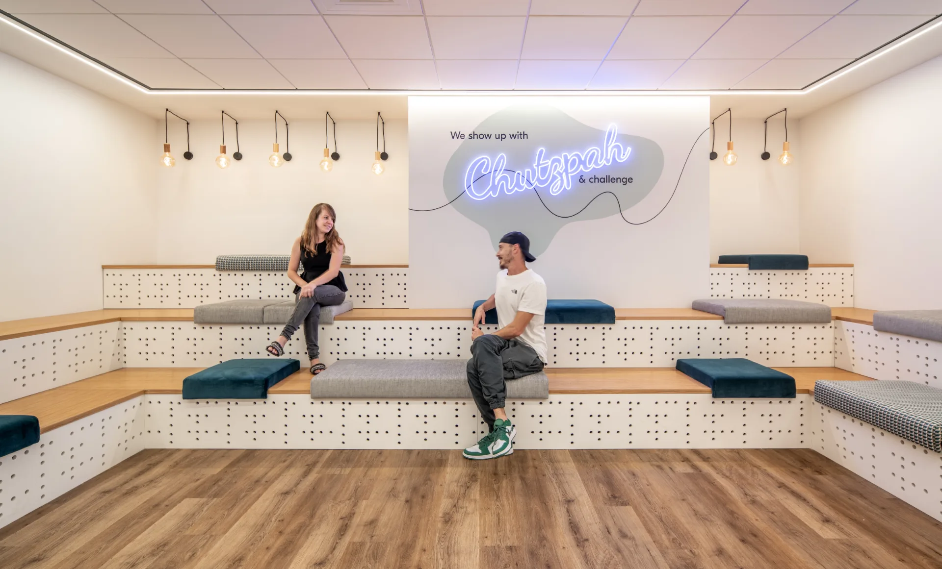 Tiered seating steps with a neon sign