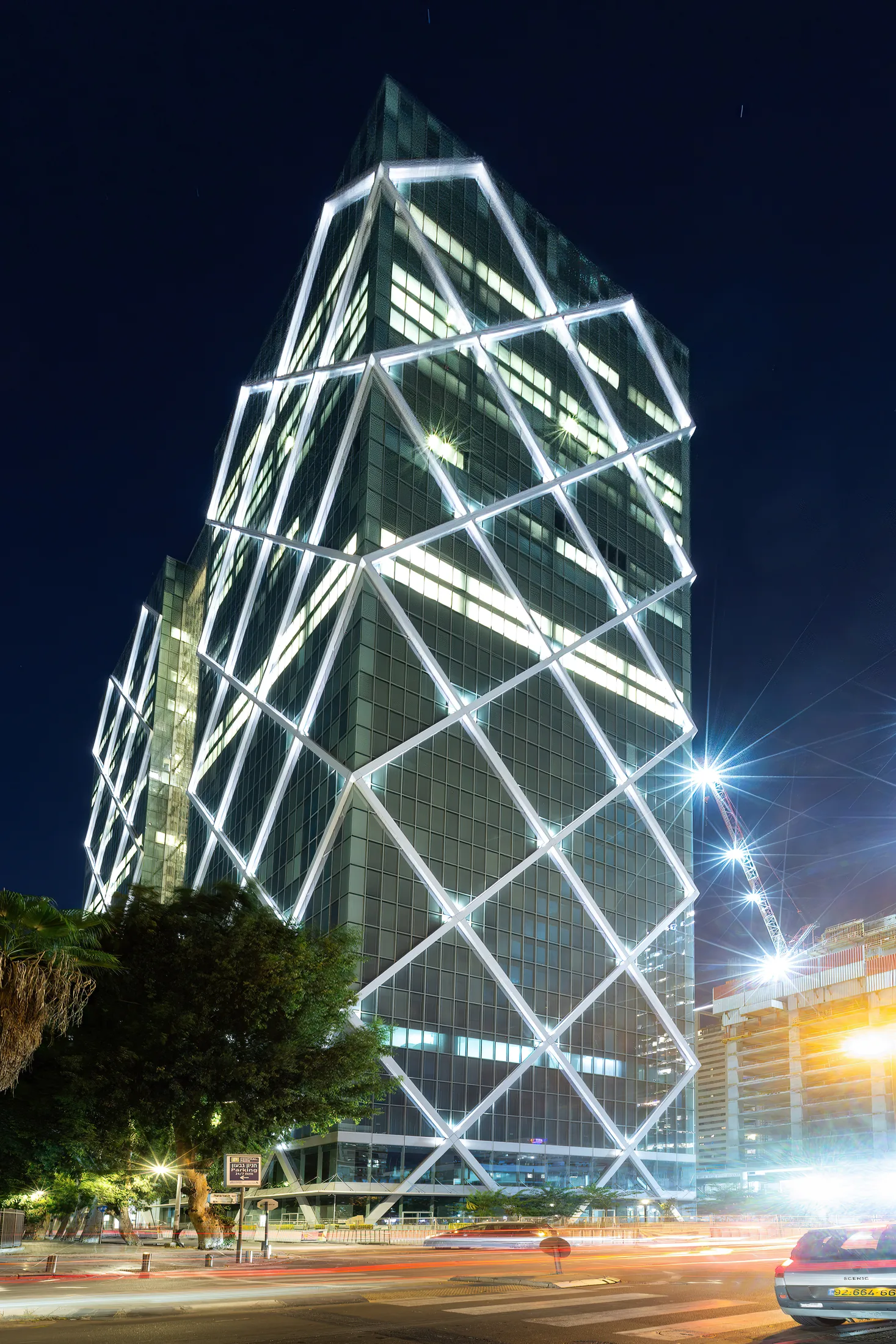 A detail of the diamond-pattern double-skin glass facade
