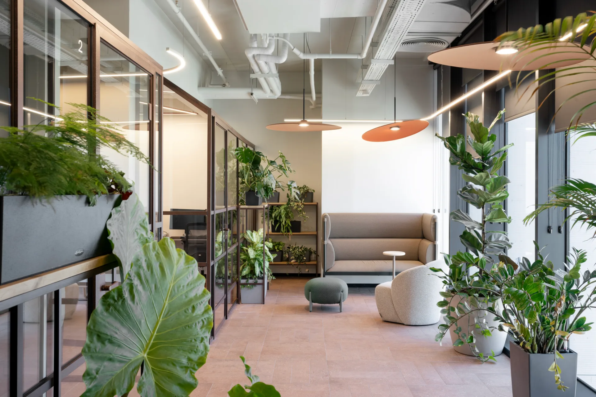 Green lounge with disc pendant lights