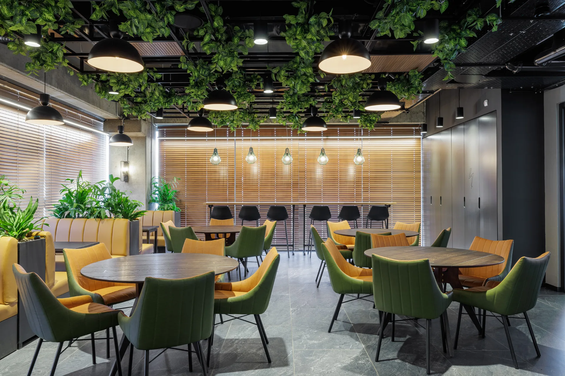 Planted lounge with colourful seating