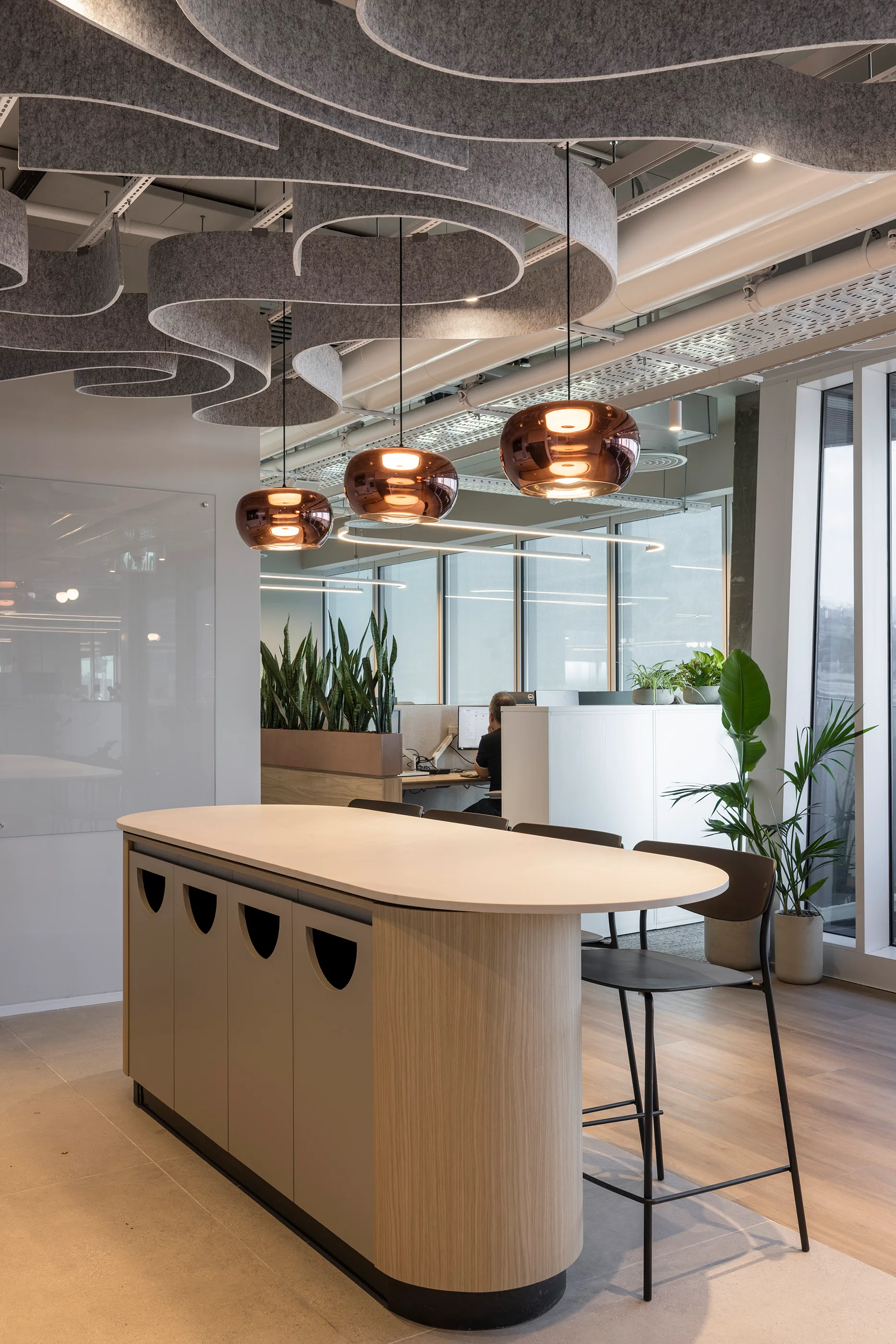 Boardroom with a linear pendant over a long table