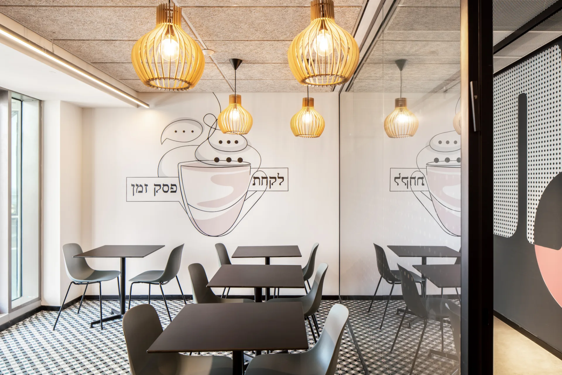 Cafe corner with woven pendants and an illustrated wall