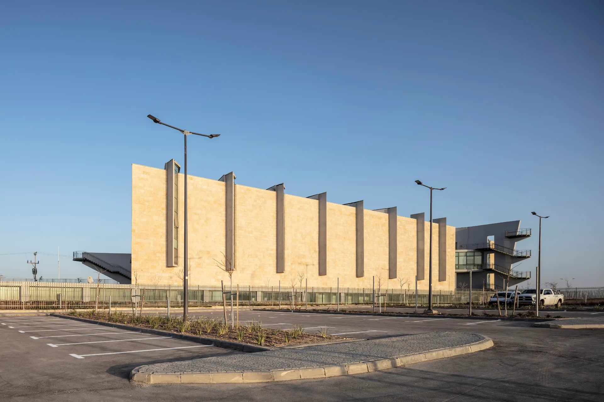 Wide view of the facade at blue hour