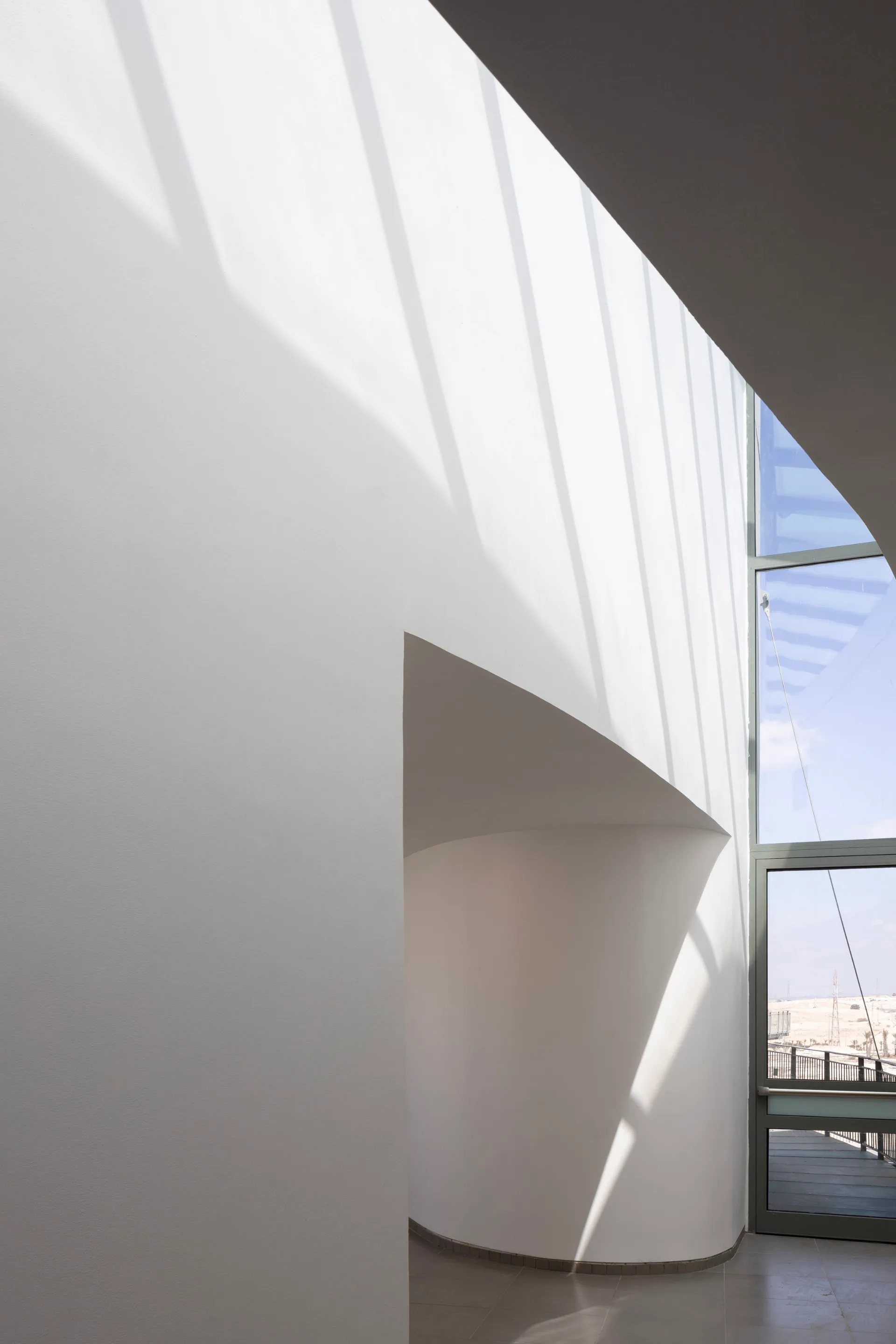 Daylight washing the curving walls