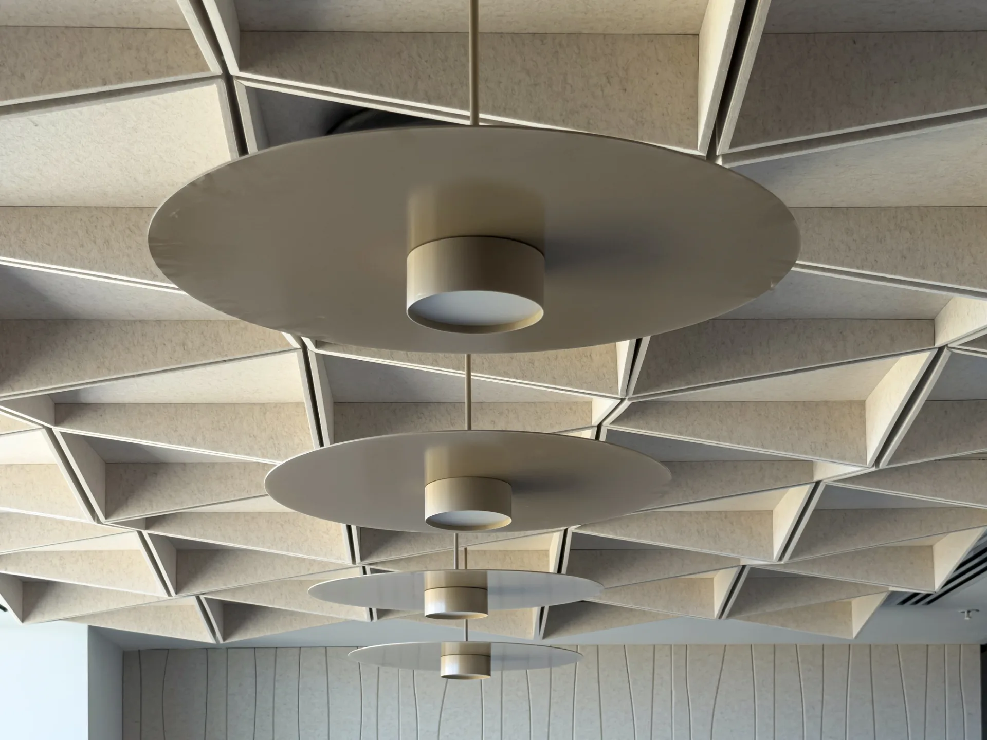 View of the disc fixtures beneath the felt ceiling