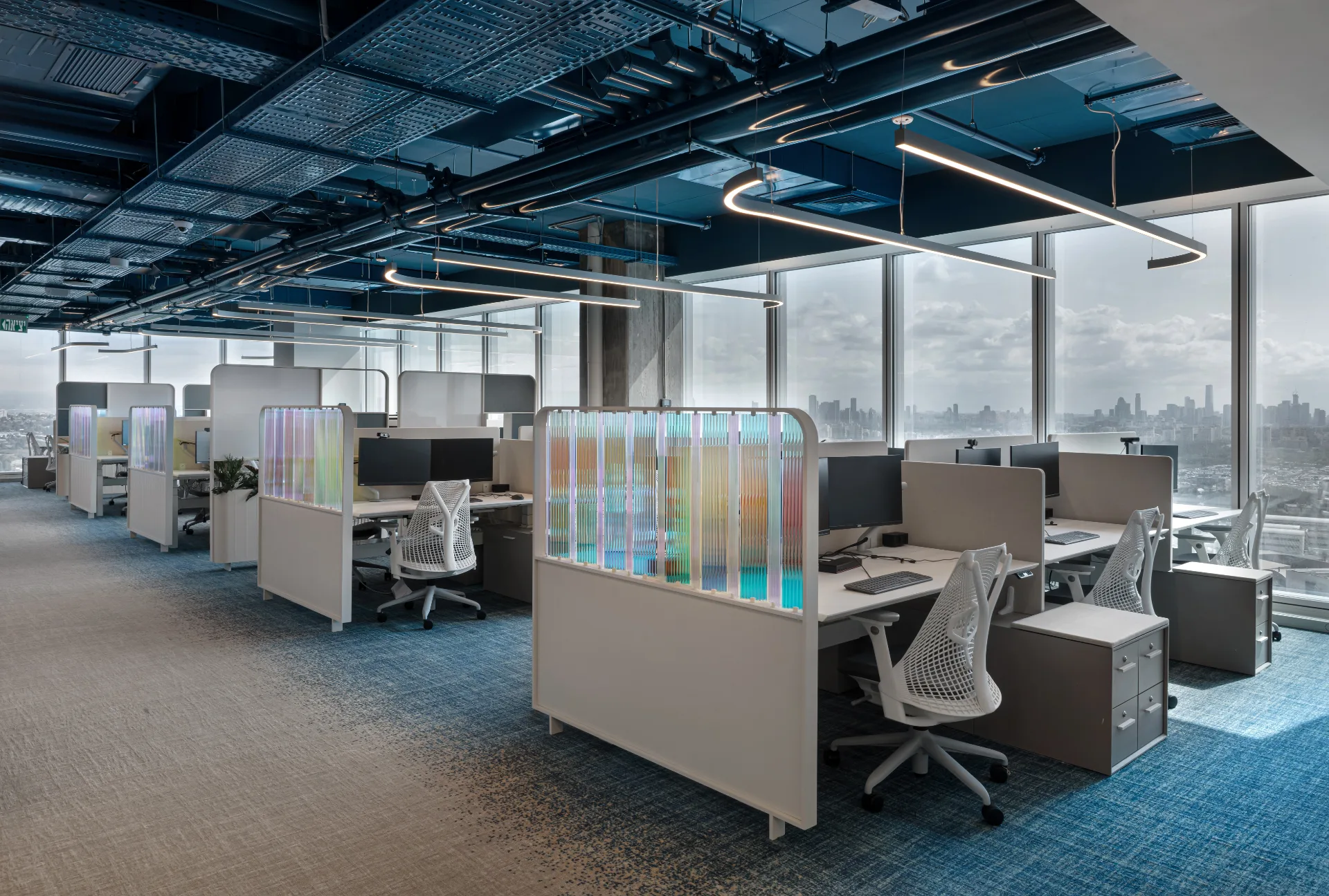 Open workspace with curving linear fixtures