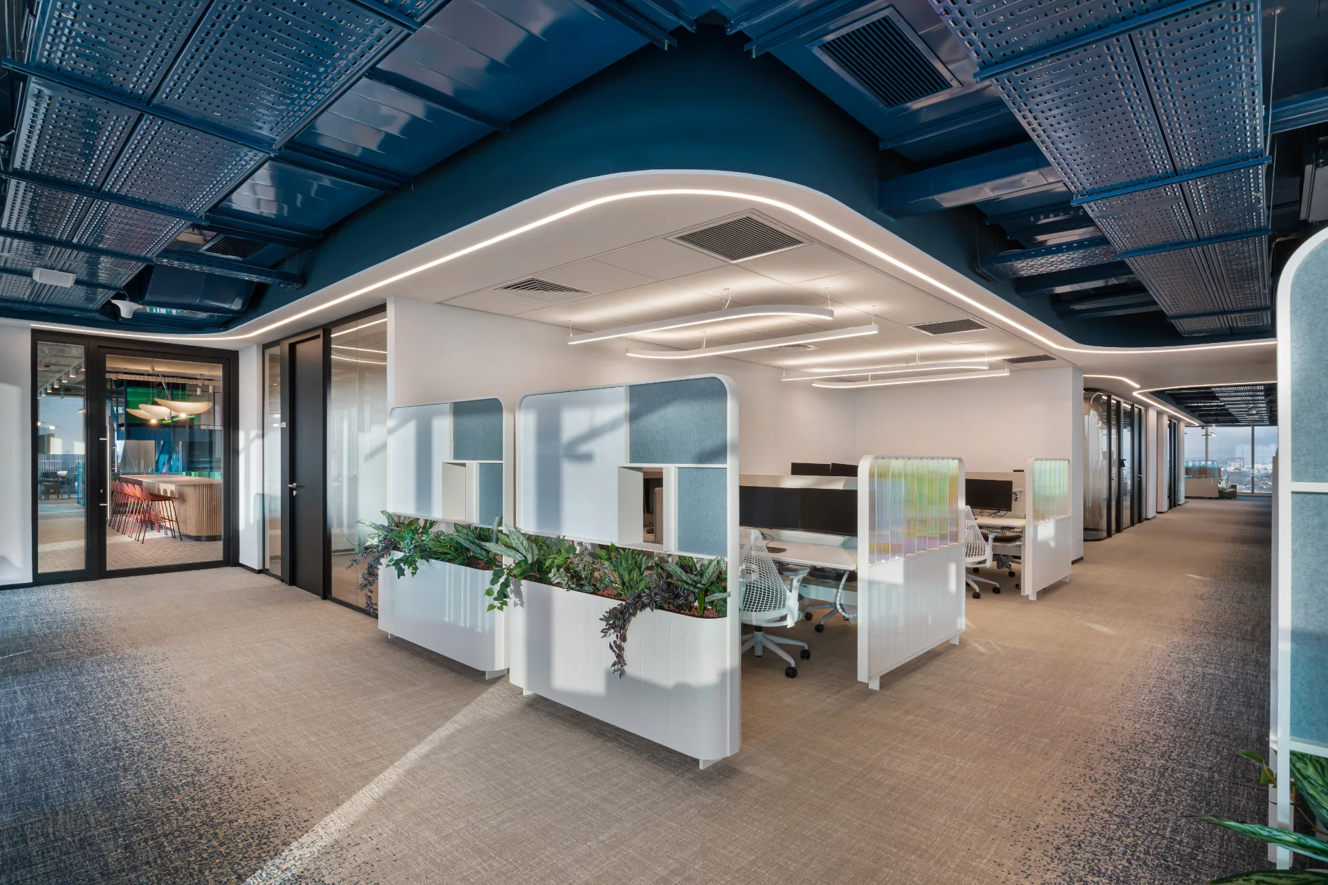 Work area with a curved light line in the ceiling