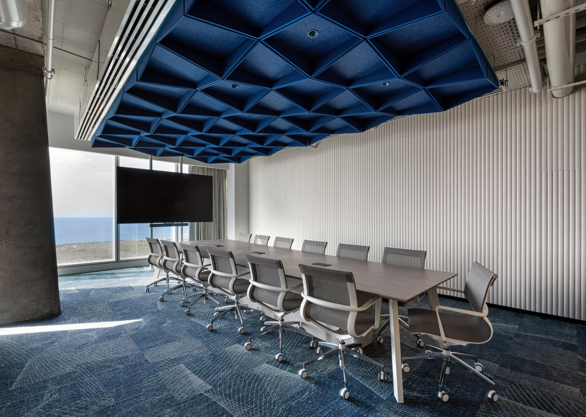 Boardroom with a blue felt ceiling and light seams
