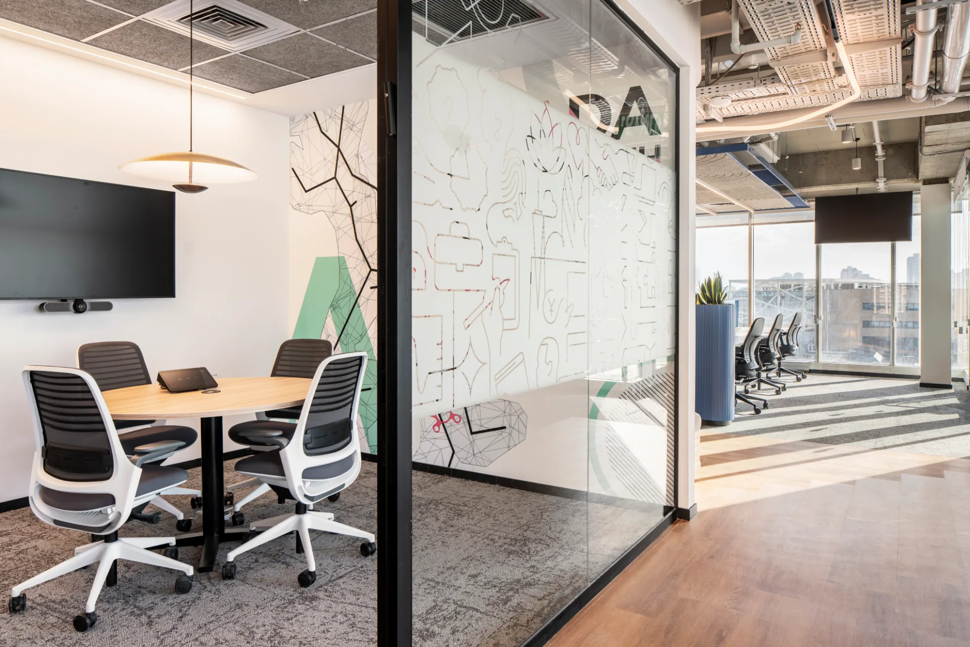 Small meeting room with a wall graphic