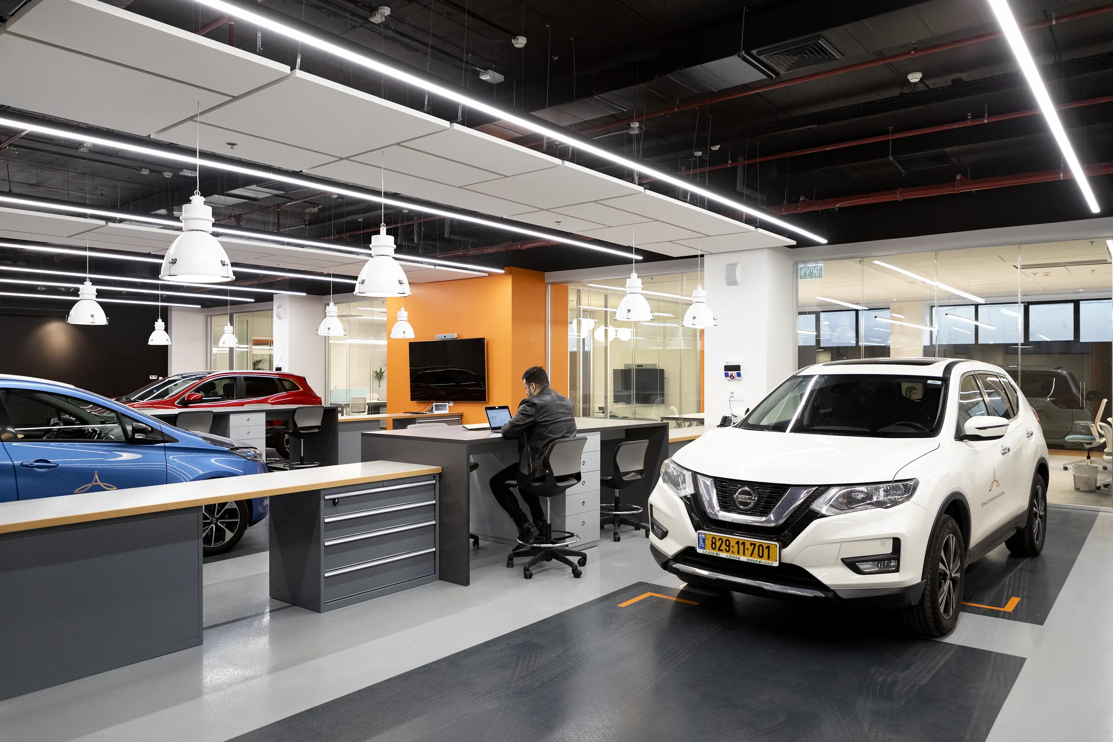 A workstation among test vehicles in the lab