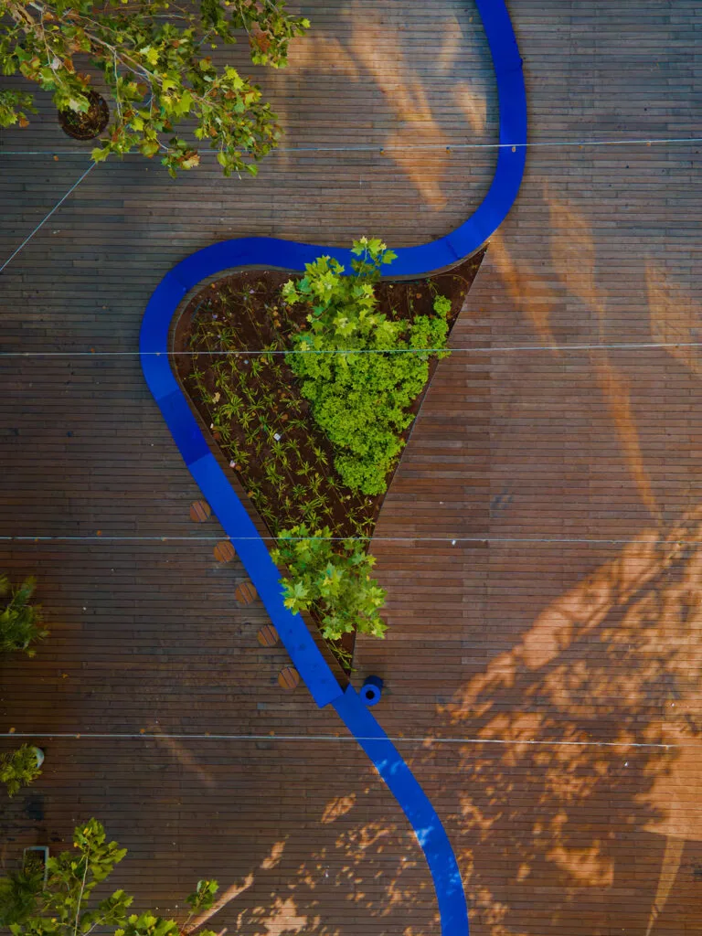 Aerial view of the blue seating element winding through the deck