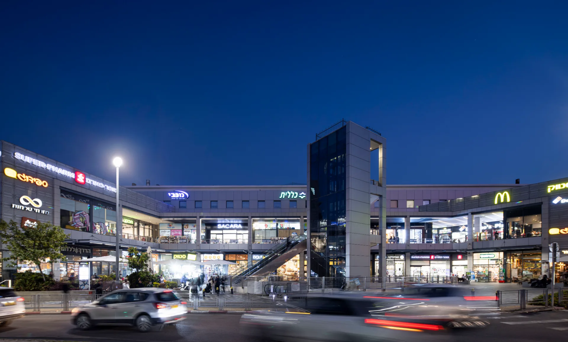Night view of the lit center with the illuminated stair tower