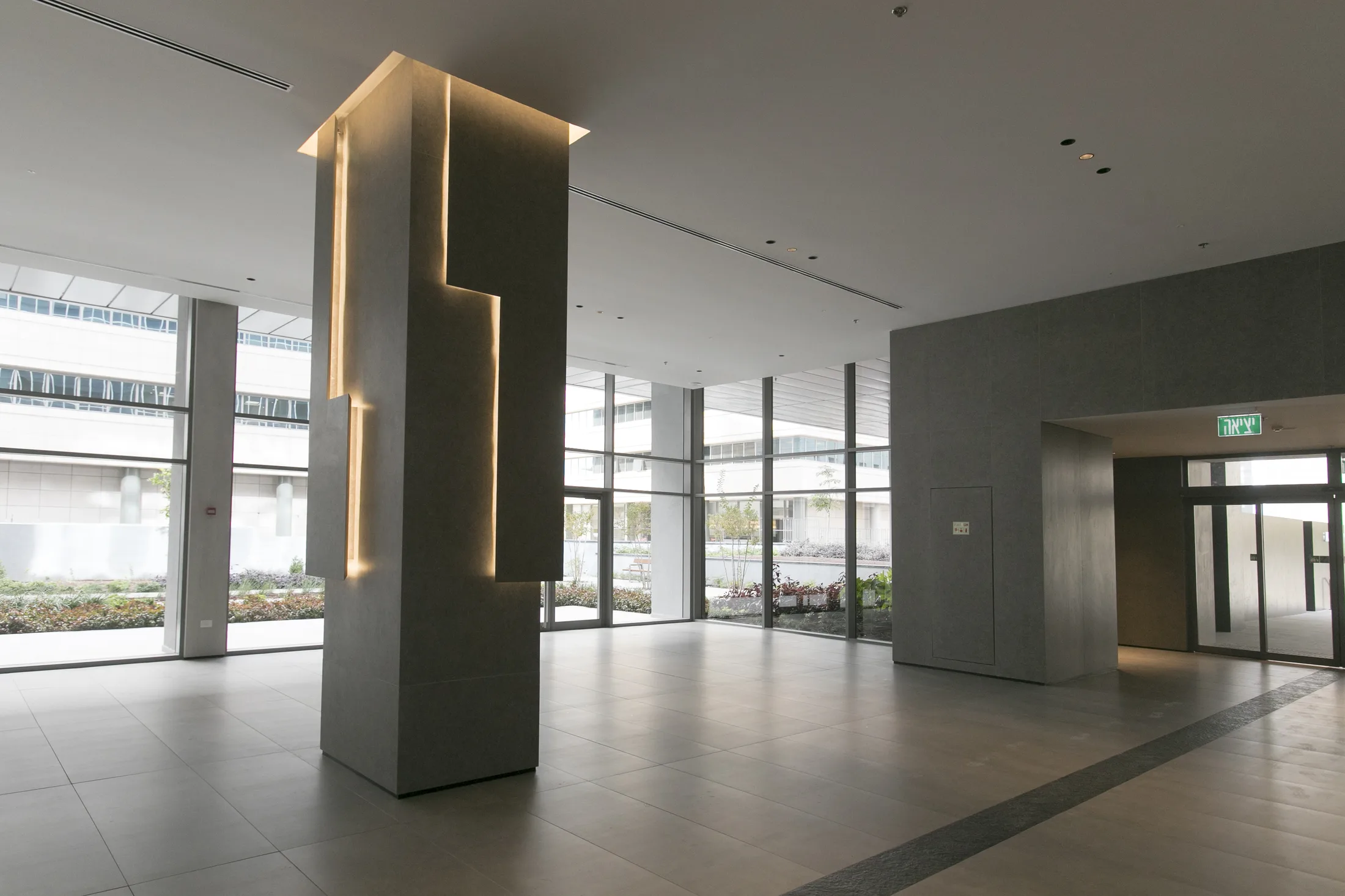 A lobby column with a recessed zigzag light groove
