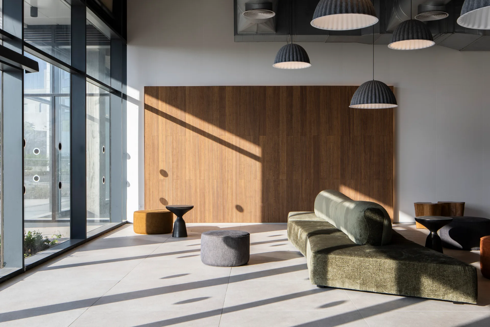 Lounge seating in the lobby beside the windows
