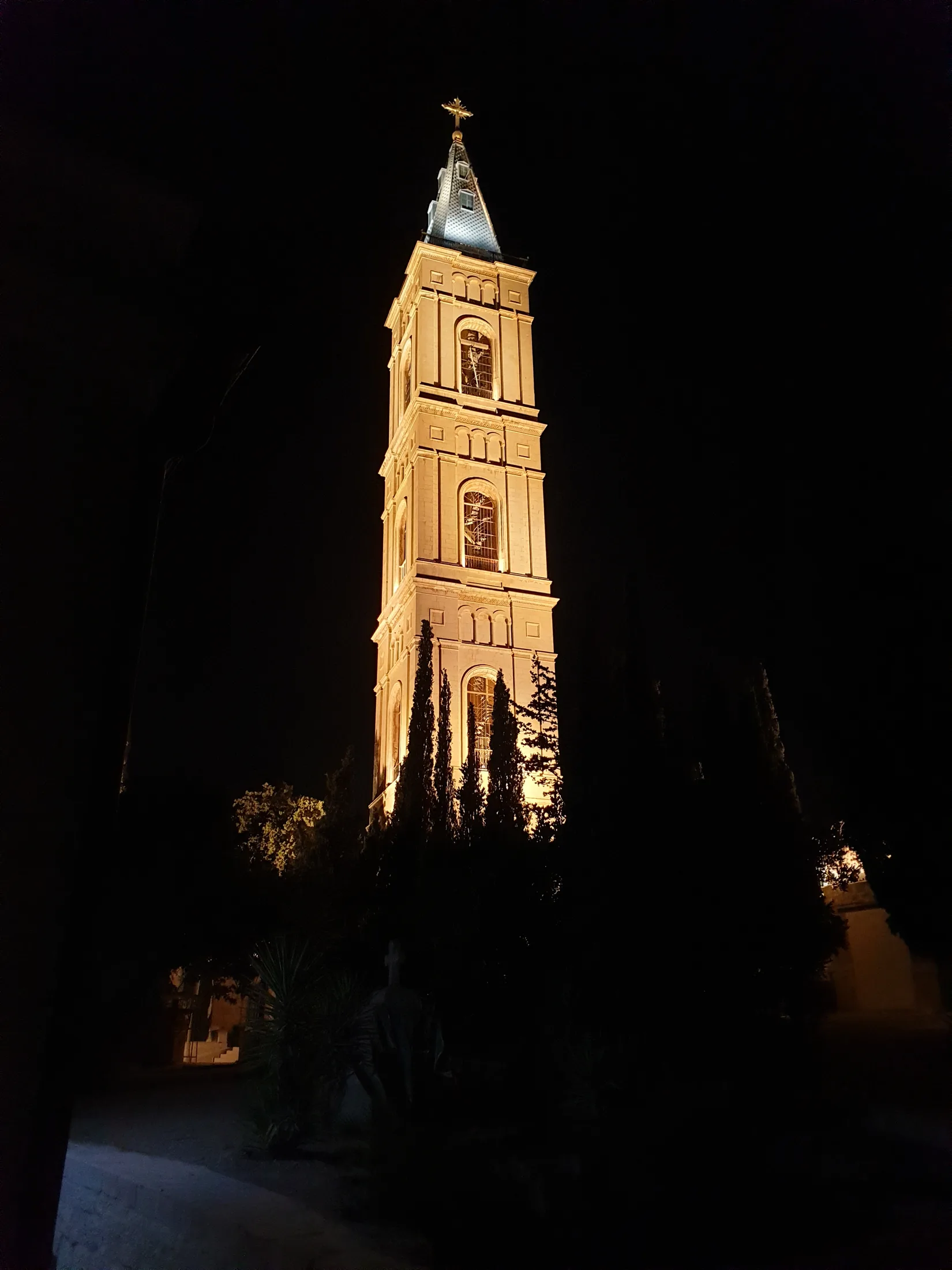 Night-time silhouette of the church tower