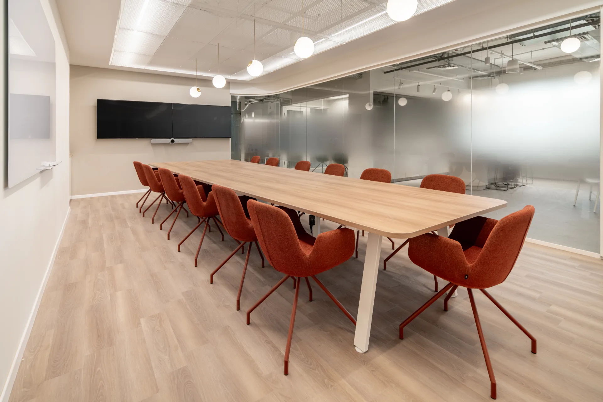 Meeting room with red chairs
