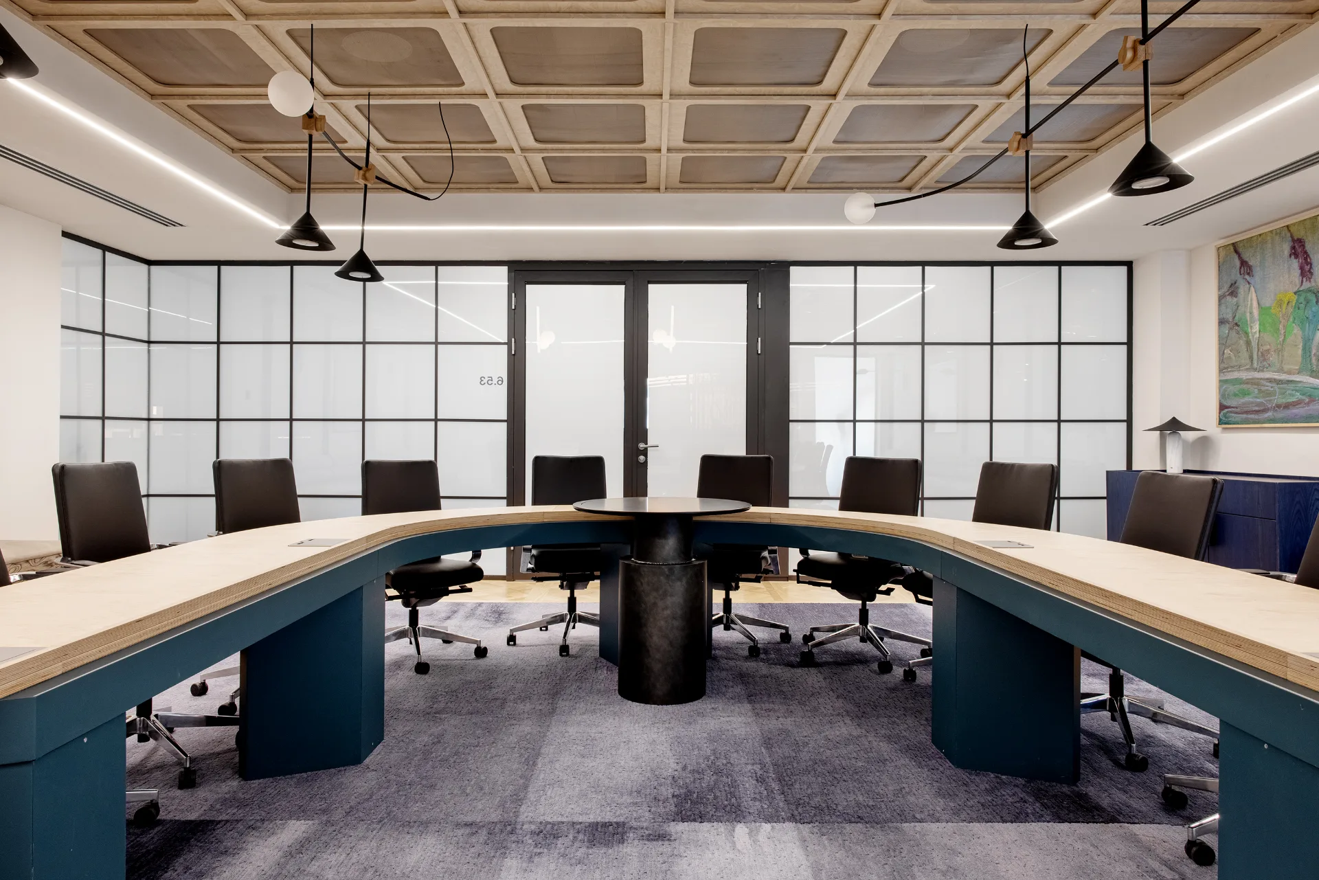 Boardroom beneath the exposed ceiling
