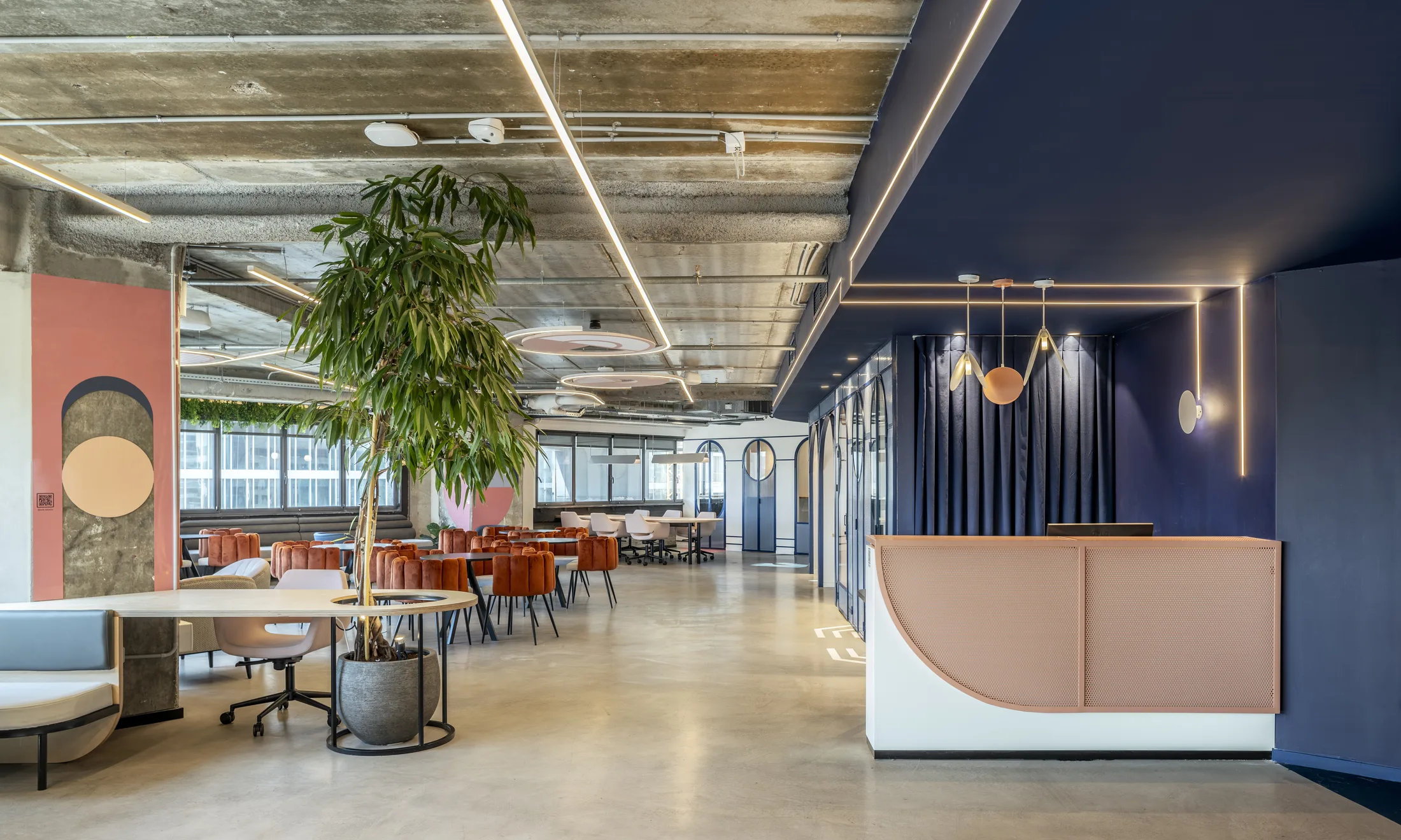 The reception and lounge with a feature tree and pendants