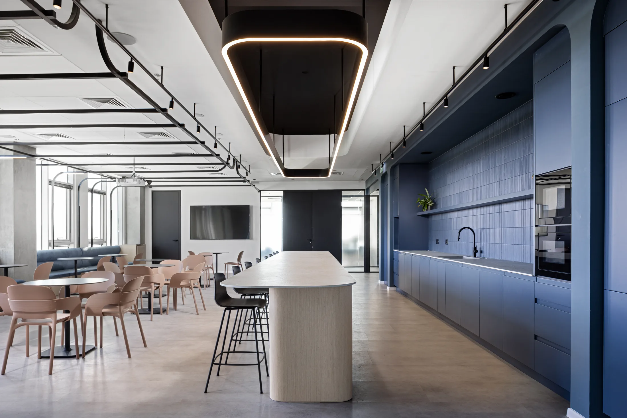 The kitchen island under the hexagonal pendant feature