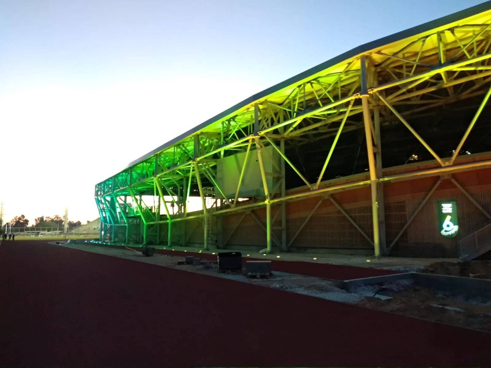 Velodrome facade in green lighting