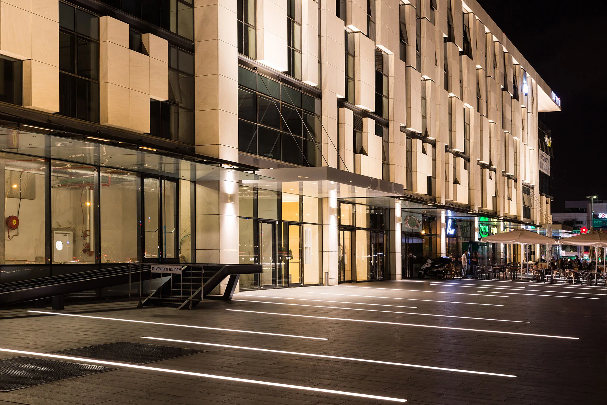 Entrance and commercial area at night
