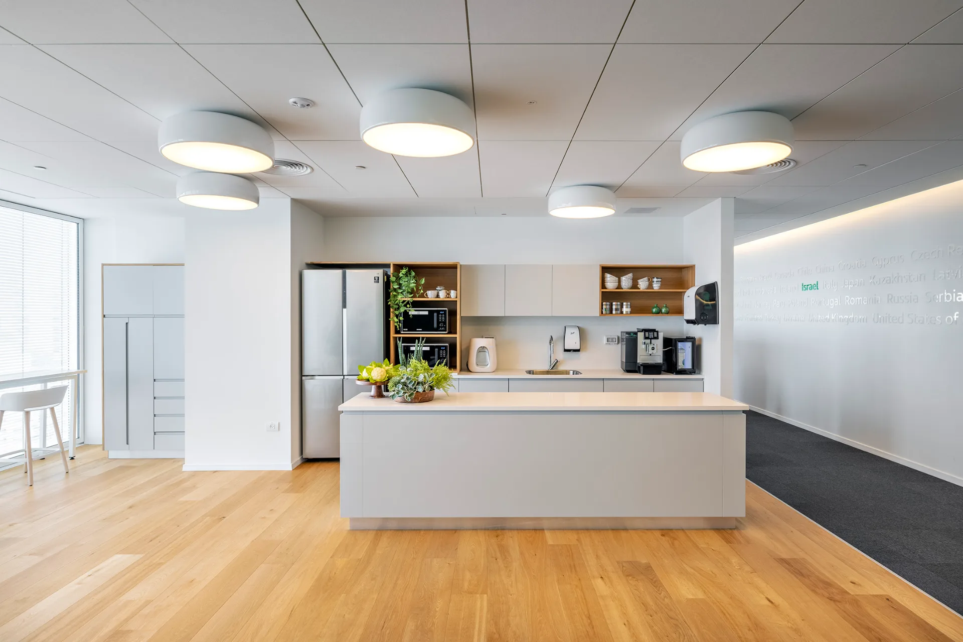 Oak-clad breakout area with soft seating