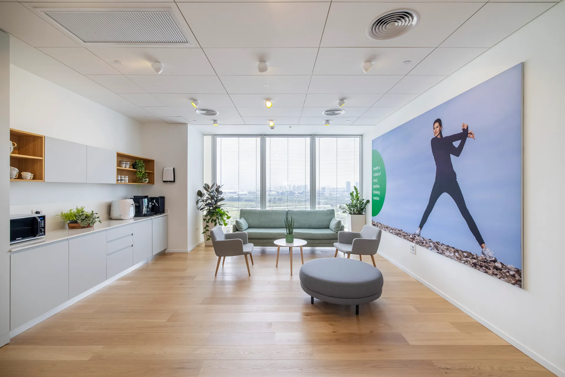 Reception counter and lounge with wood flooring