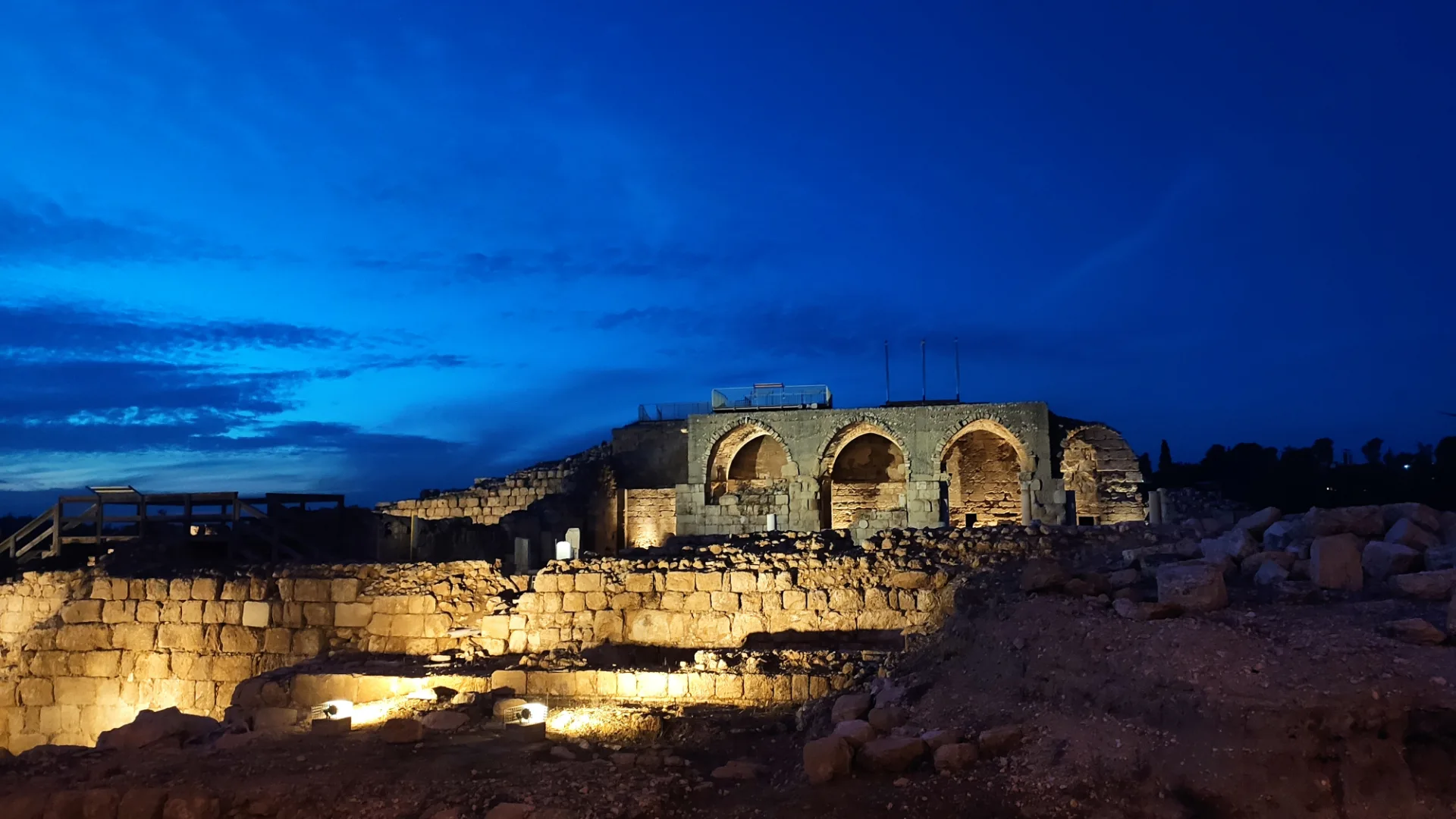 The Crusader arches lit against the twilight sky