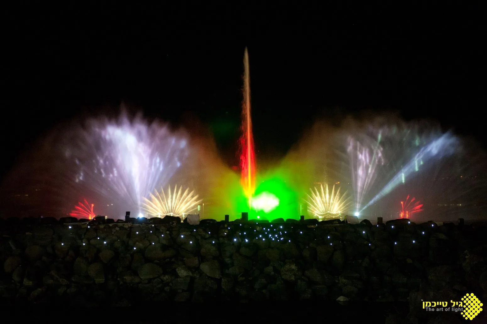 The show's colorful finale of jets, light, and laser