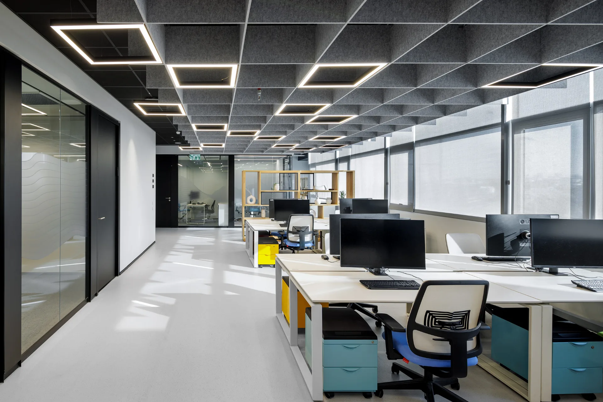 Open workspace with colour accents and greenery