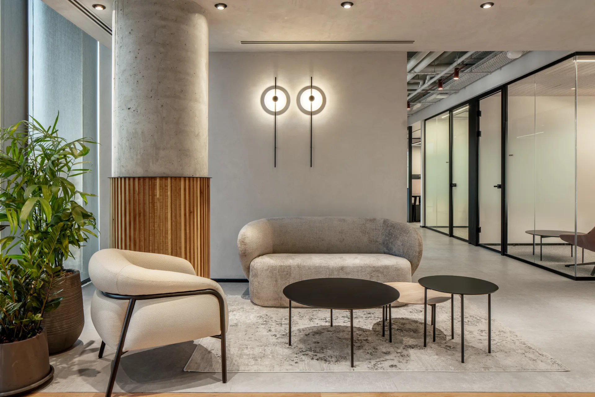 Lounge corner with soft seating and wall lights